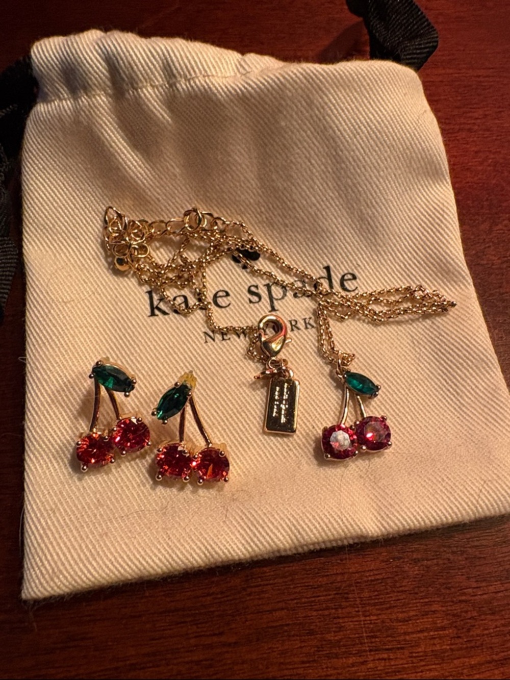 Kate Spade Gold plated Cherry Jewelry Set with red and Green Crystals